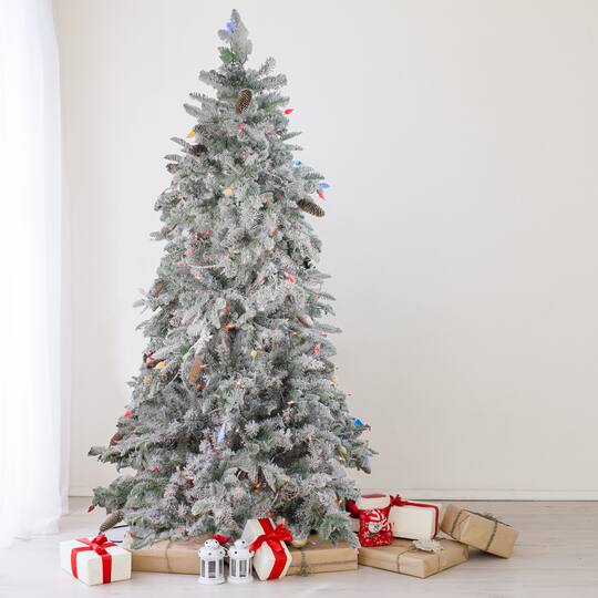 6.5ft. Pre-Lit Flocked Dunton Spruce Slim Artificial Christmas Tree, Multicolor Lights